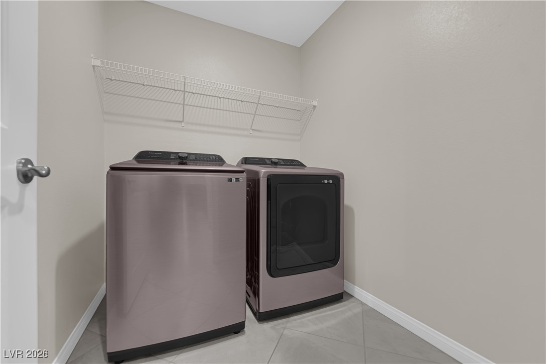 2606 Ercolano Street Henderson, NV 89044 - Photo 32 of 46 Laundry room with tile floors, washer & dryer