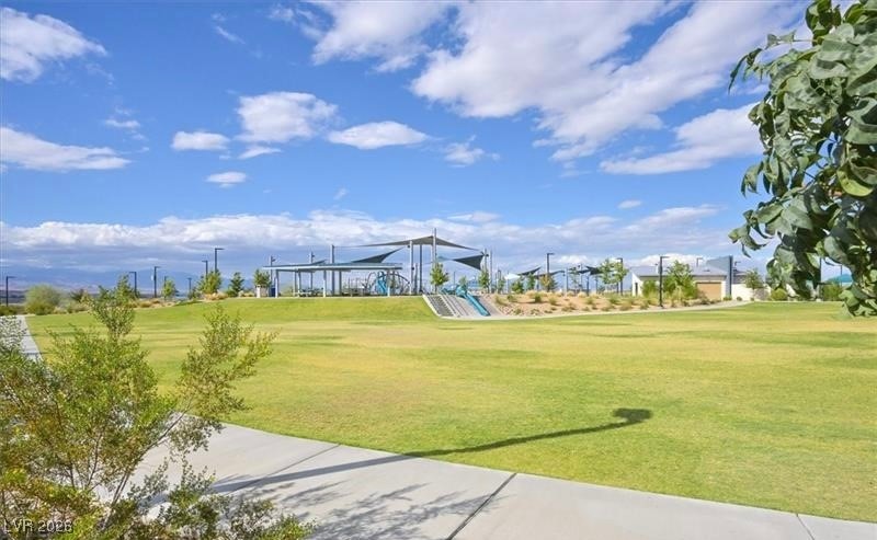2606 Ercolano Street Henderson, NV 89044 - Photo 37 of 46 Inspirada community offers swimming pool, BBQ area, swimming pool & spa, tennis courts, playground, park, social calender, walking trails & security.