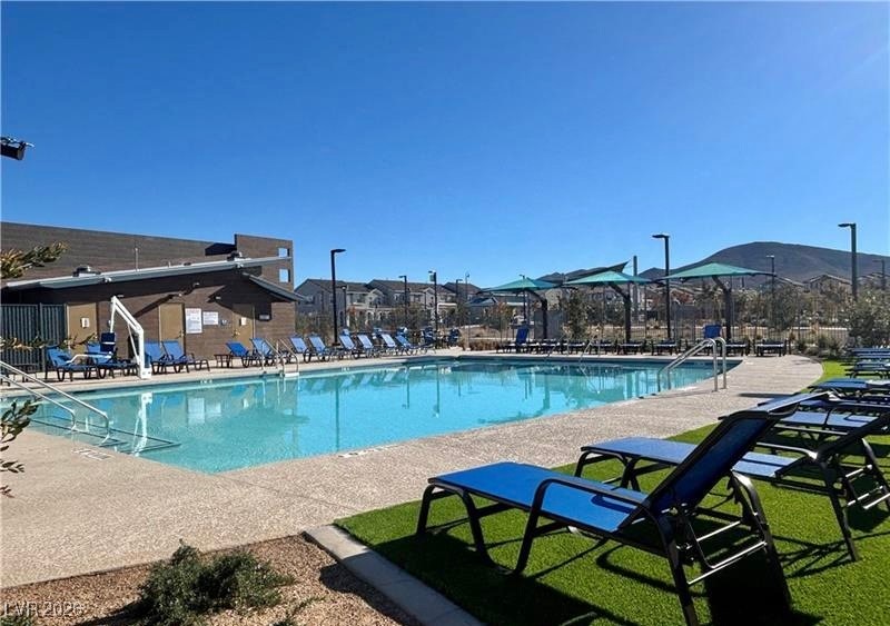 2606 Ercolano Street Henderson, NV 89044 - Photo 44 of 46 Inspirada community offers swimming pool, BBQ area, swimming pool & spa, tennis courts, playground, park, social calender, walking trails & security.