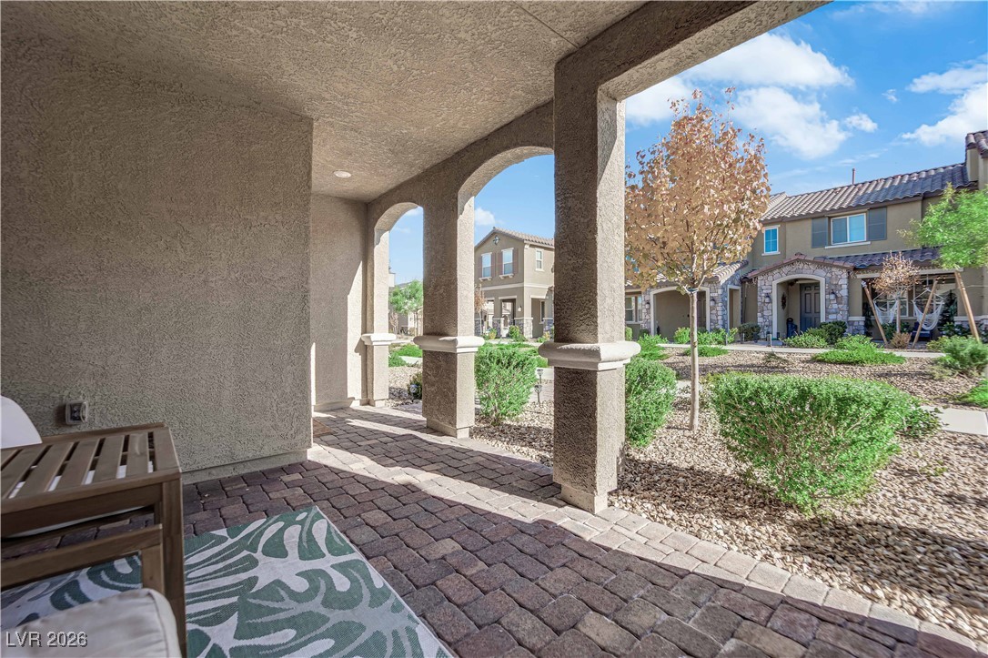 2606 Ercolano Street Henderson, NV 89044 - Photo 6 of 46 Covered front courtyard with pavers