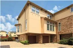 a front view of a building with many windows