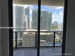 55 Southwest 9th Street, Unit 2504 Miami, FL 33130 - Photo 11 of 29 a view of a balcony with a tree