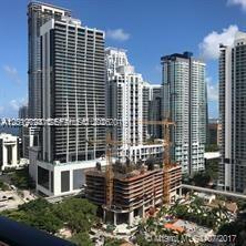 55 Southwest 9th Street, Unit 2504 Miami, FL 33130 - Photo 13 of 29 a front view of a building with glass windows