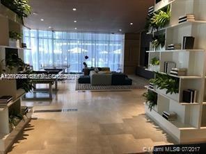 55 Southwest 9th Street, Unit 2504 Miami, FL 33130 - Photo 19 of 29 a lobby with furniture and a potted plant