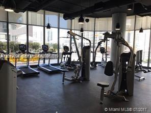 55 Southwest 9th Street, Unit 2504 Miami, FL 33130 - Photo 22 of 29 a view of a room with gym equipment