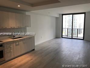 55 Southwest 9th Street, Unit 2504 Miami, FL 33130 - Photo 3 of 29 a view of an empty room with a window
