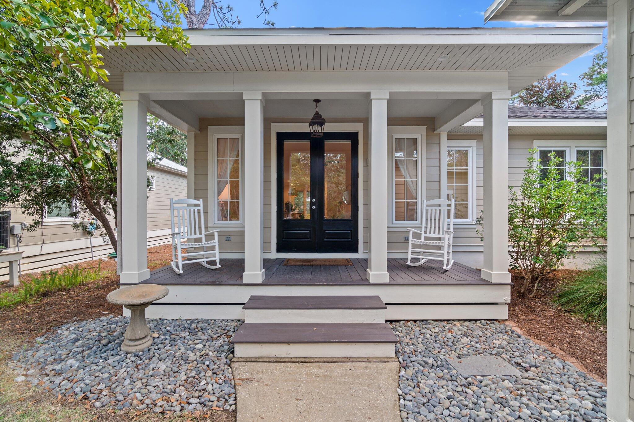 a front view of a house with a porch