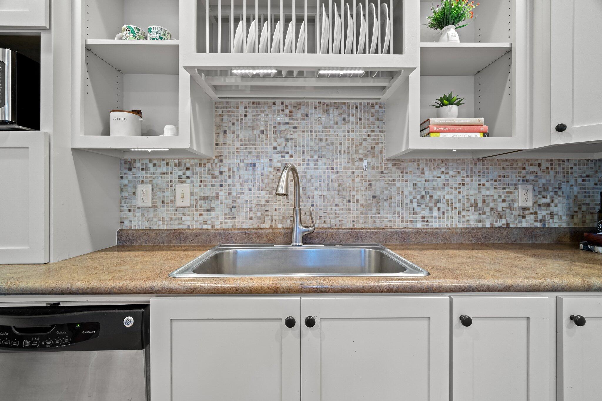 124 East Wild Blueberry Way Santa Rosa Beach, FL 32459 - Photo 13 of 38 a kitchen with a sink and a wooden floor