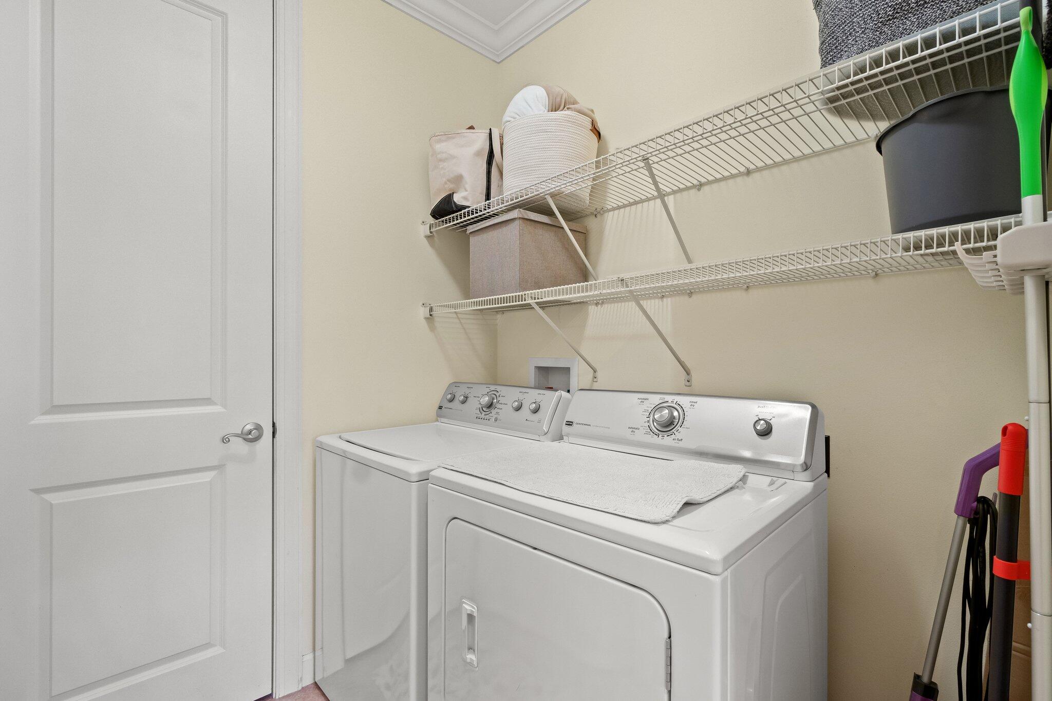 124 East Wild Blueberry Way Santa Rosa Beach, FL 32459 - Photo 22 of 38 a utility room with dryer and washer