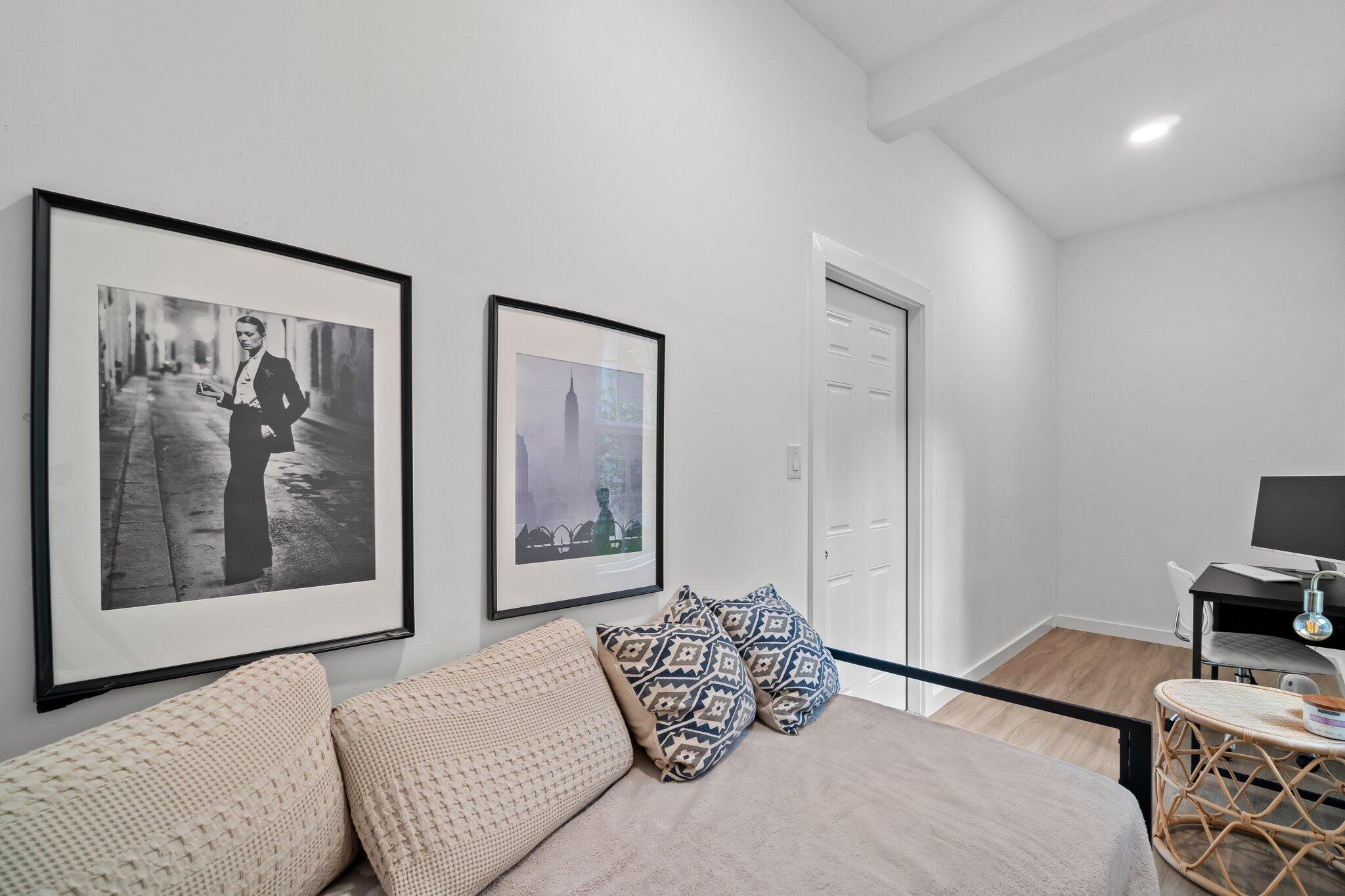 124 East Wild Blueberry Way Santa Rosa Beach, FL 32459 - Photo 25 of 38 a bedroom with a bed and a painting on the wall