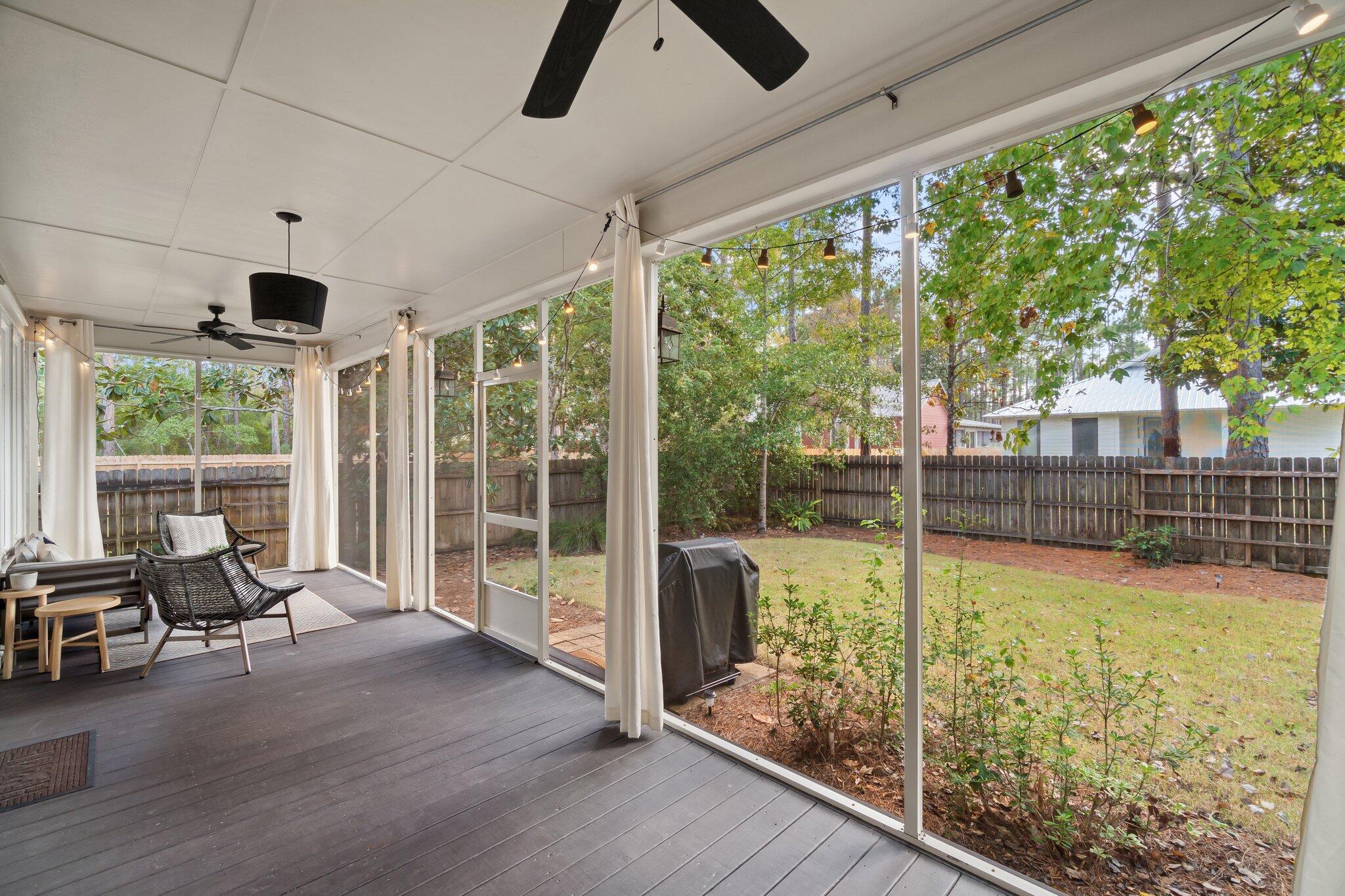 124 East Wild Blueberry Way Santa Rosa Beach, FL 32459 - Photo 3 of 38 a living room with hardwood floor and ceiling fan