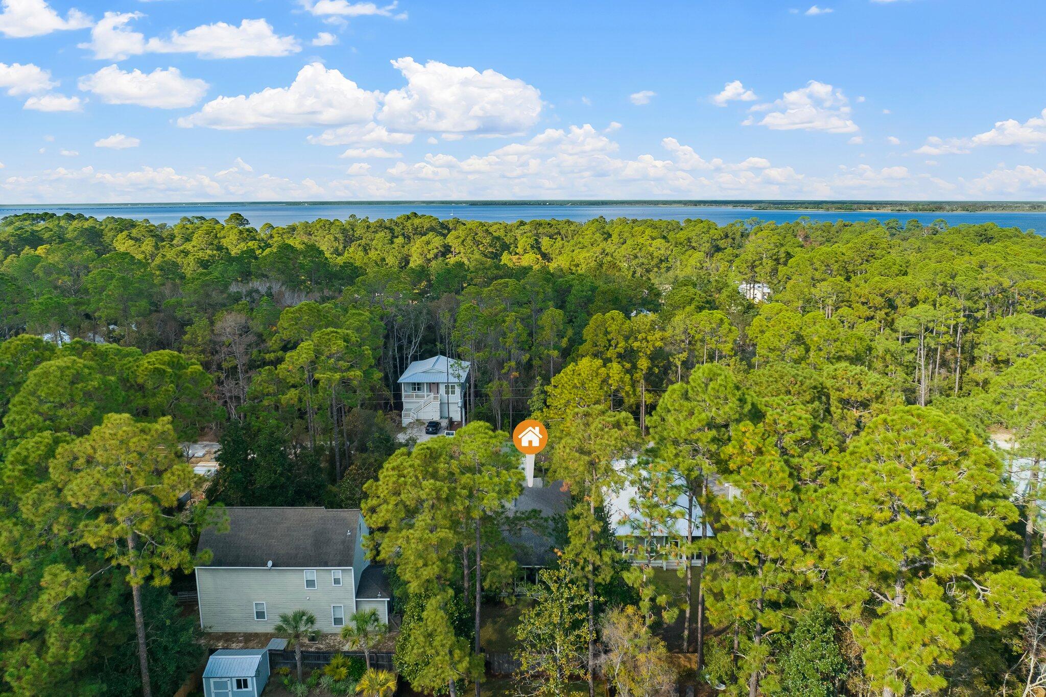 124 East Wild Blueberry Way Santa Rosa Beach, FL 32459 - Photo 34 of 38 a view of a yard