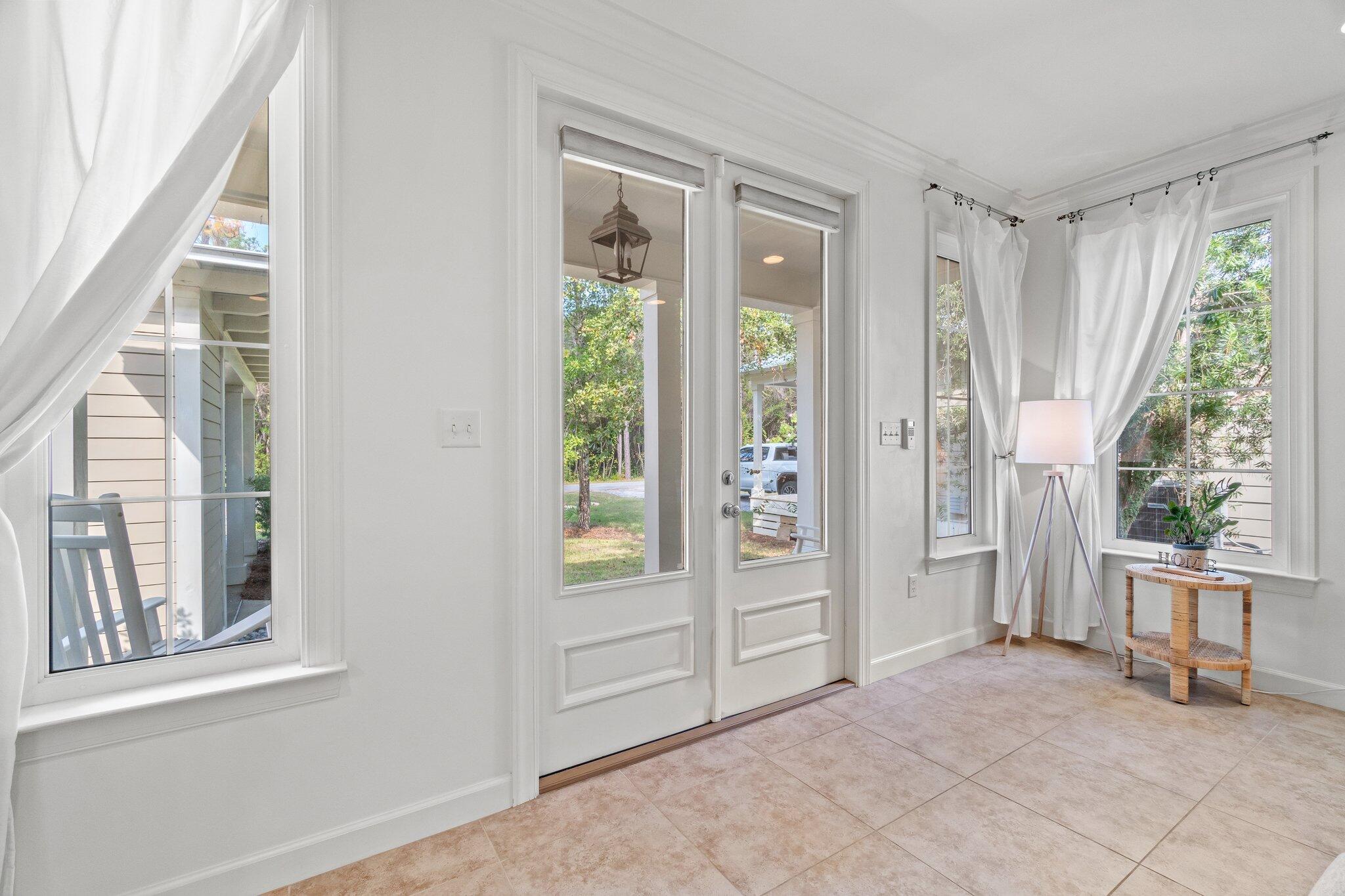 124 East Wild Blueberry Way Santa Rosa Beach, FL 32459 - Photo 6 of 38 an empty room with windows and closet