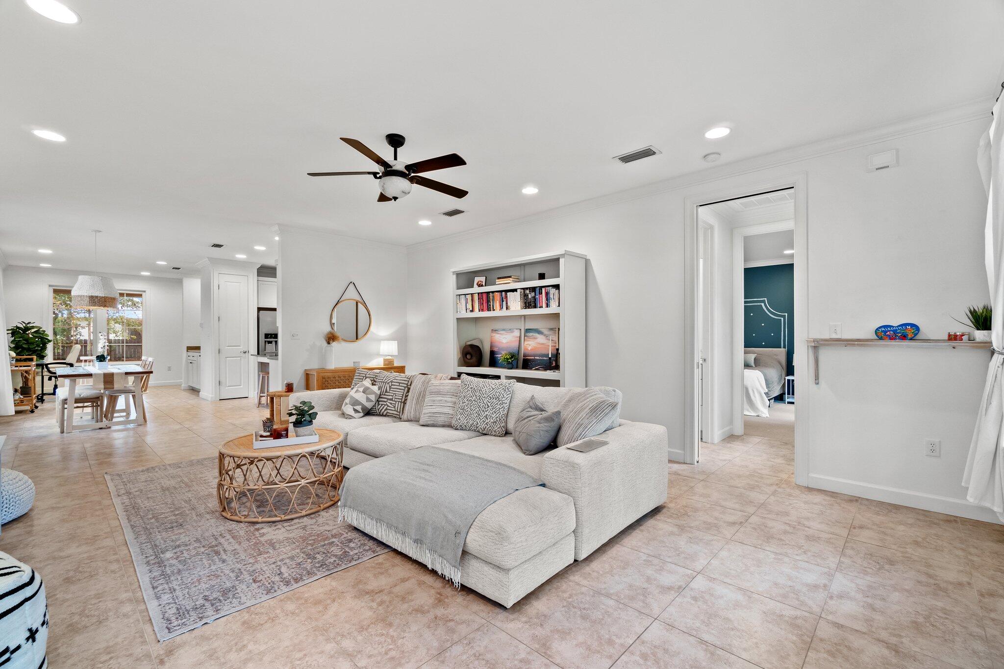 124 East Wild Blueberry Way Santa Rosa Beach, FL 32459 - Photo 9 of 38 a living room with furniture and a ceiling fan