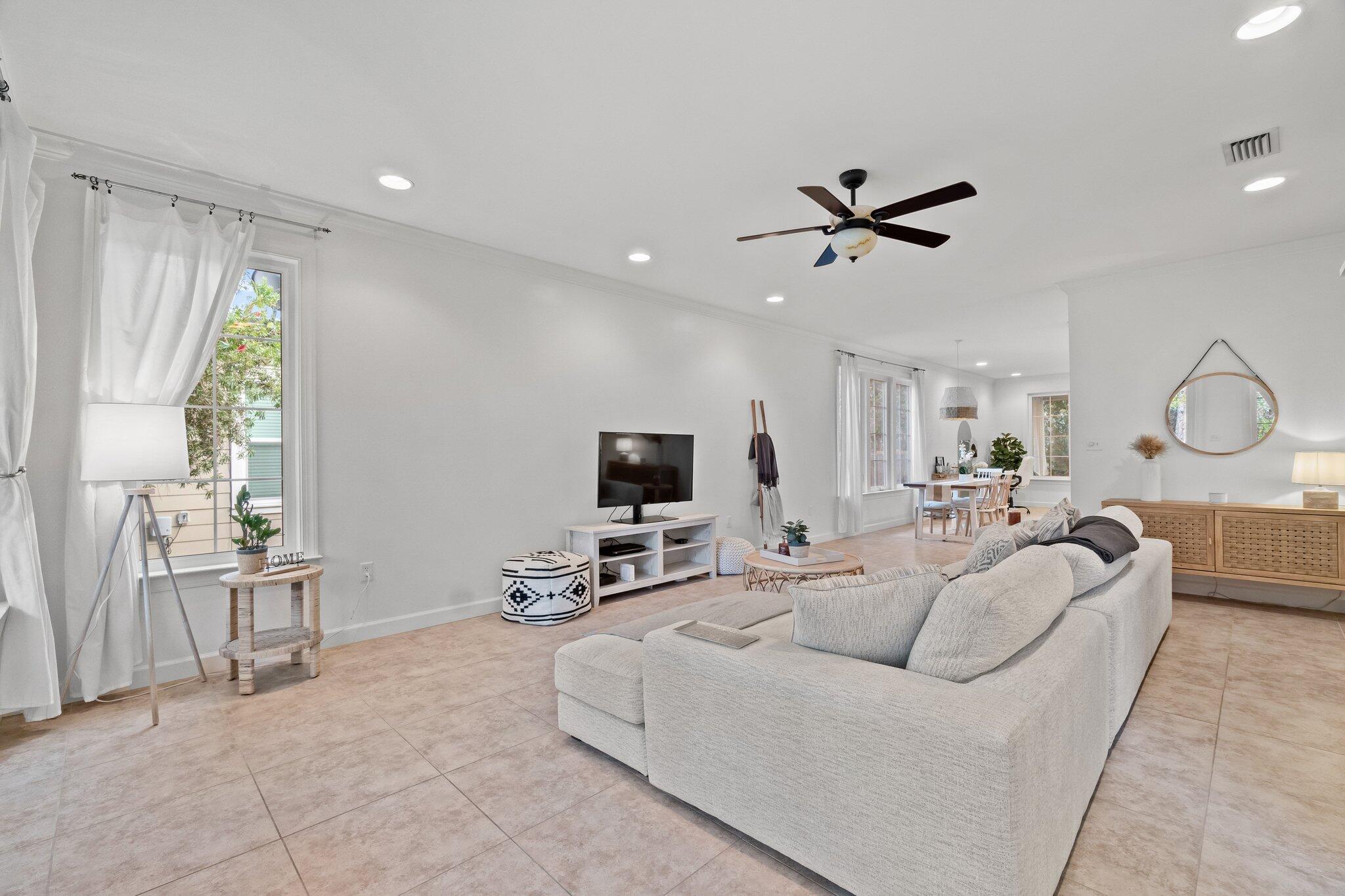 124 East Wild Blueberry Way Santa Rosa Beach, FL 32459 - Photo 10 of 38 a living room with furniture and a flat screen tv