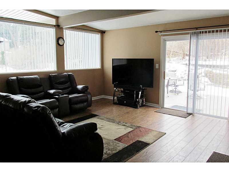 218 Sunset Road Pittsburgh, PA 15237 - Photo 3 of 17 Living Room. Large windows add plenty of natural light.