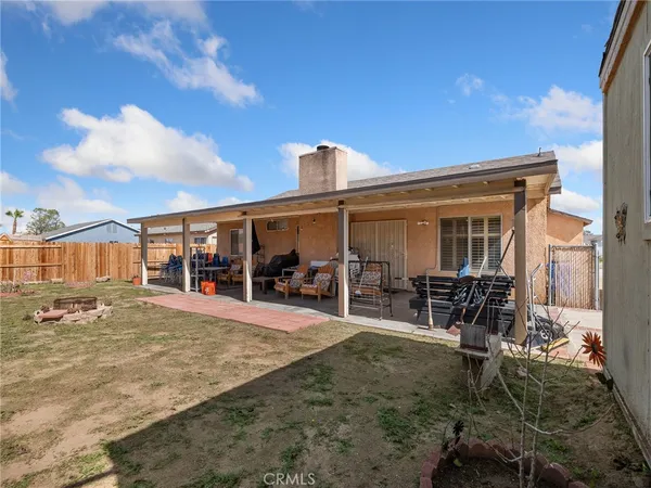 a view of a house with patio