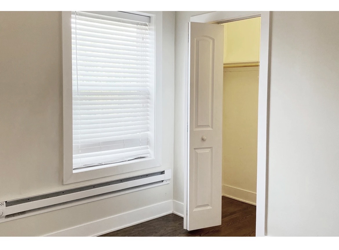 4218 North Clark Street, Unit 2 Chicago, IL 60613 - Photo 11 of 12 a view of a bathroom that has a window in it