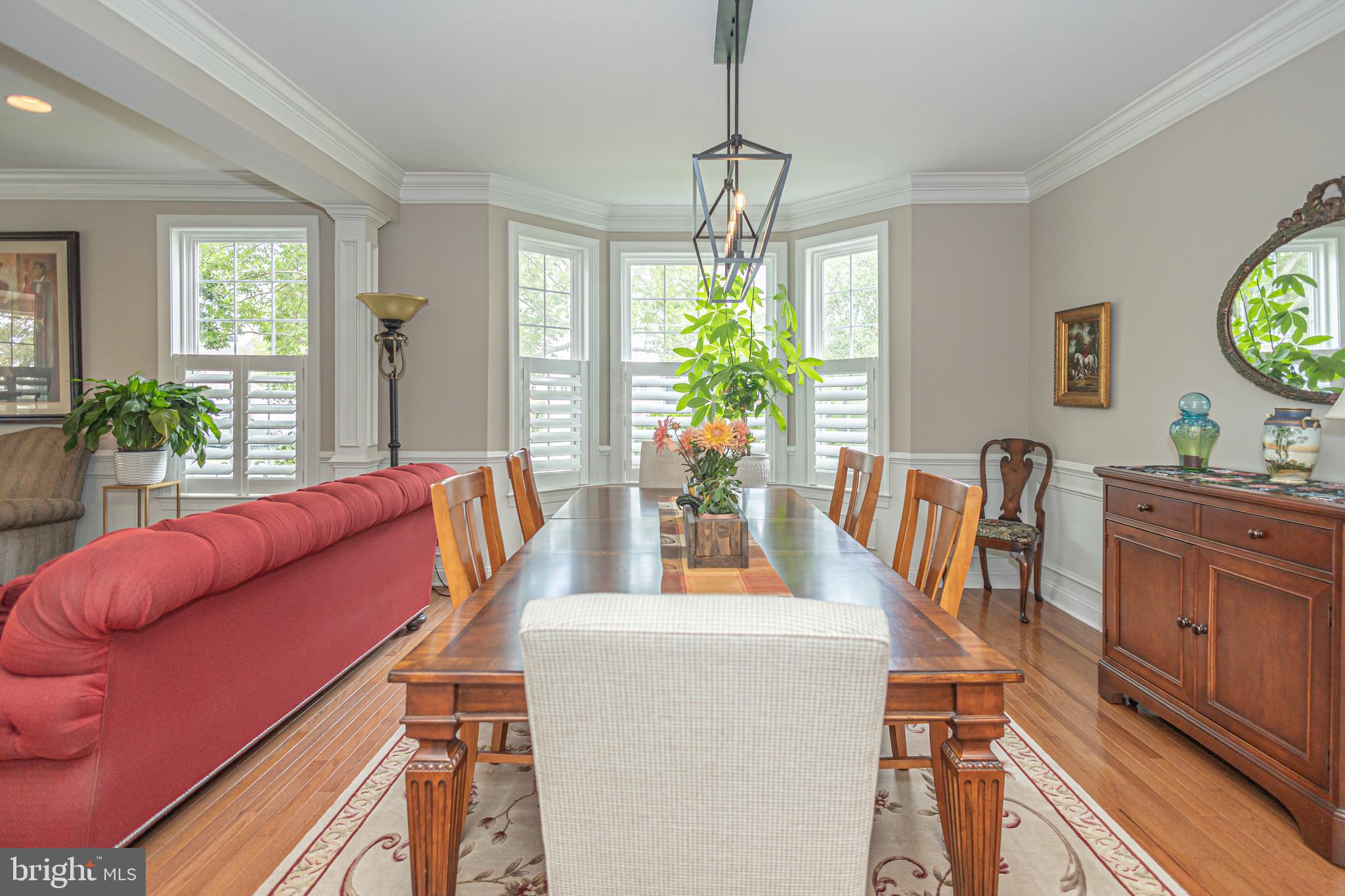 501 Titus Road Lambertville, NJ 08530 - Photo 15 of 62 a view of a dining room with furniture a livingroom and chandelier