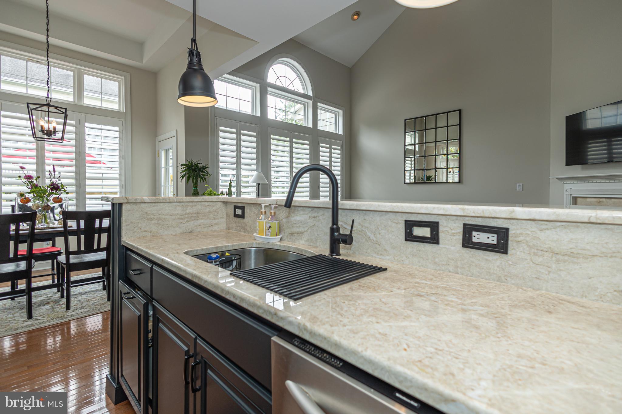 501 Titus Road Lambertville, NJ 08530 - Photo 19 of 62 a kitchen with granite countertop a sink and a stove top oven
