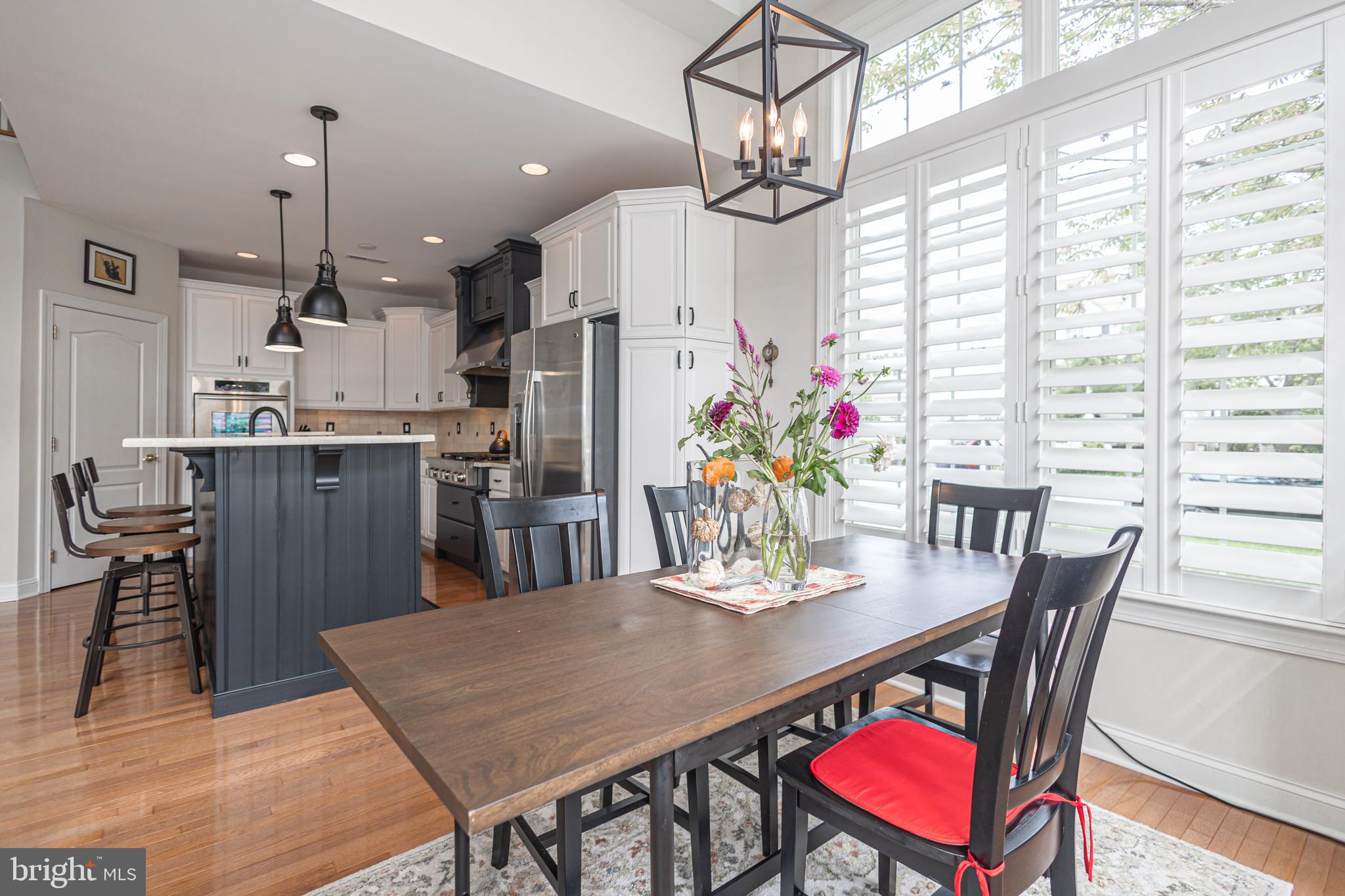 501 Titus Road Lambertville, NJ 08530 - Photo 25 of 62 a view of a dining room with furniture window and wooden floor