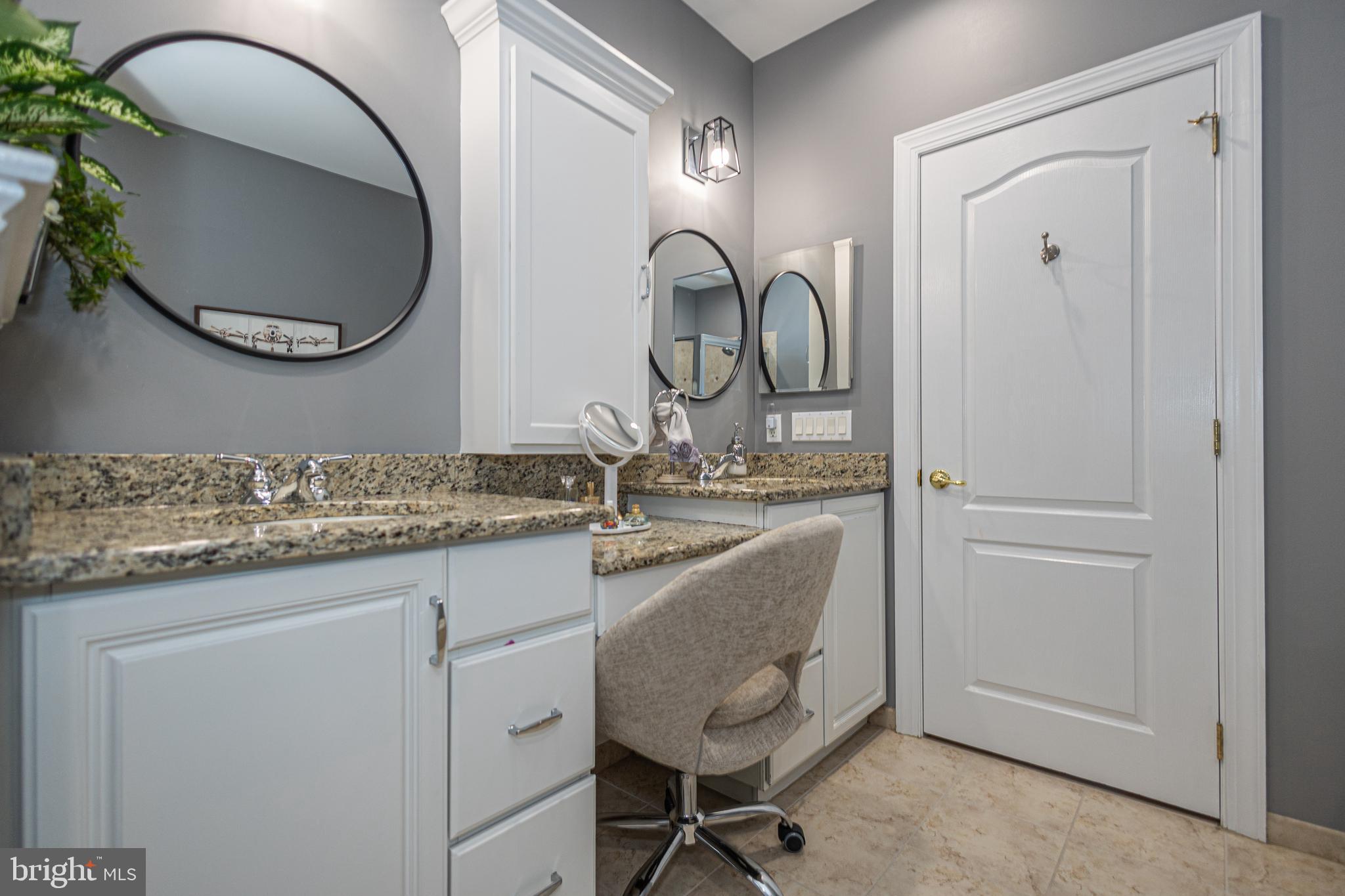 501 Titus Road Lambertville, NJ 08530 - Photo 41 of 62 a bathroom with a granite countertop double vanity sink and a mirror