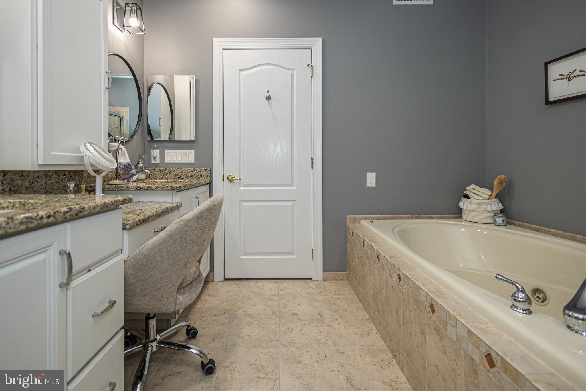 501 Titus Road Lambertville, NJ 08530 - Photo 42 of 62 a spacious bathroom with a tub sink and mirror