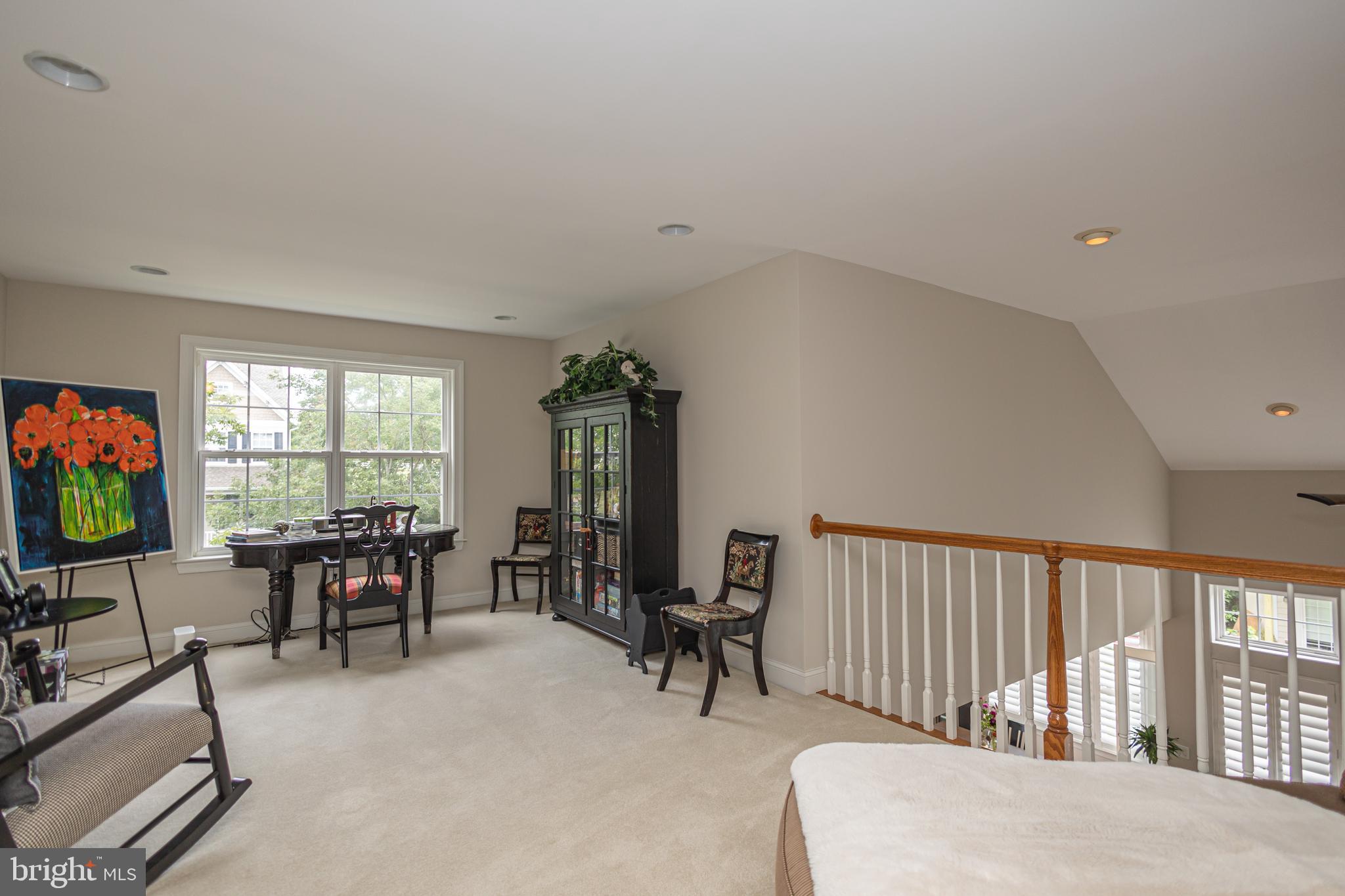 501 Titus Road Lambertville, NJ 08530 - Photo 50 of 62 a living room with furniture a flat screen tv and a large window