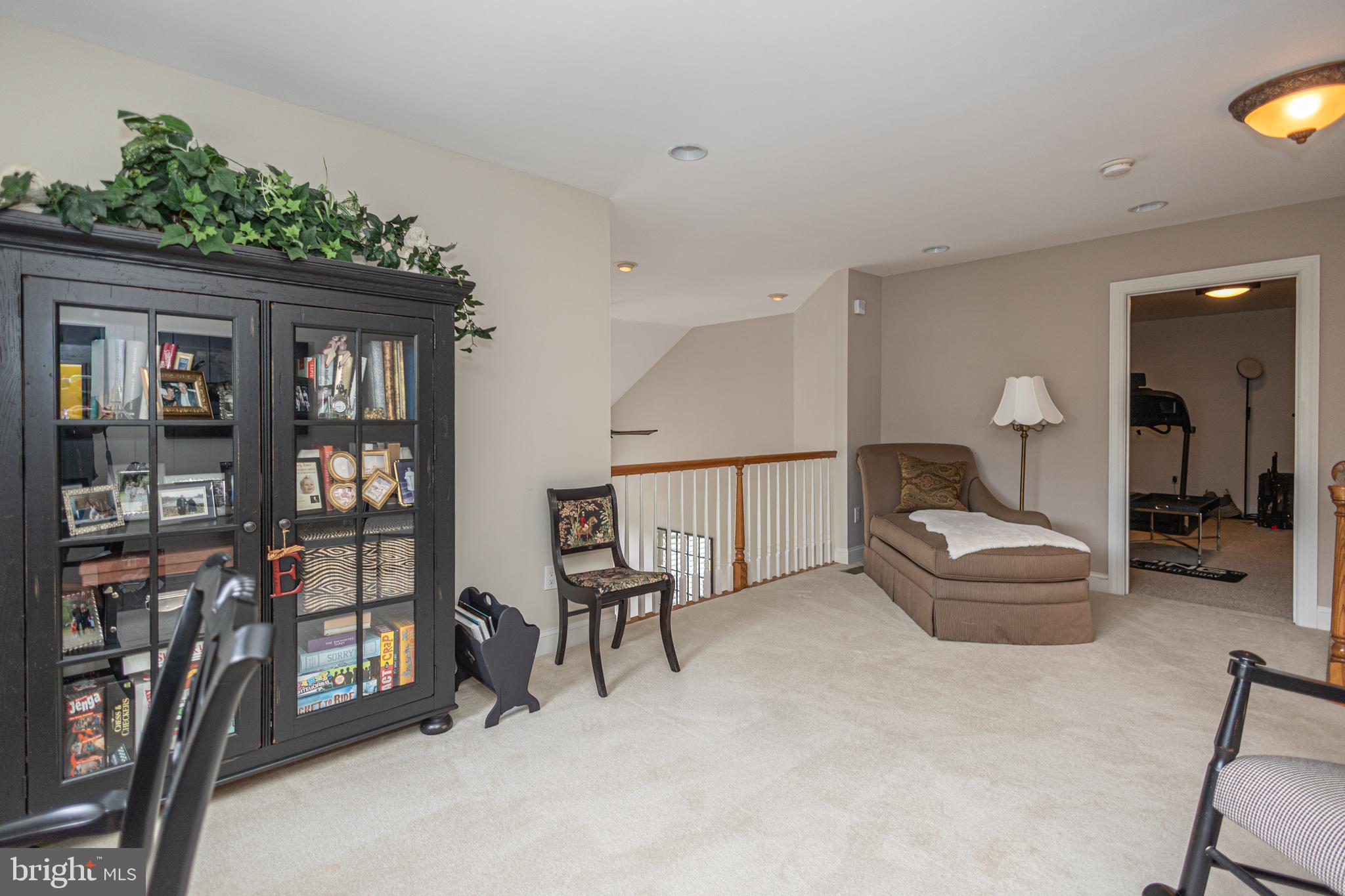 501 Titus Road Lambertville, NJ 08530 - Photo 57 of 62 a bedroom with furniture and a book shelf