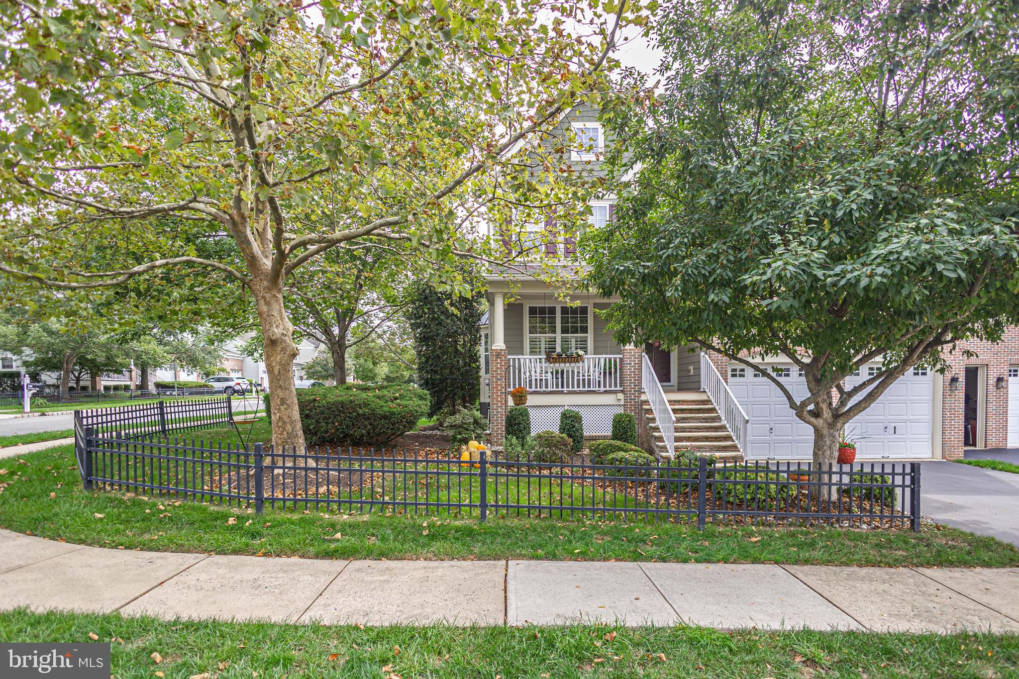 501 Titus Road Lambertville, NJ 08530 - Photo 59 of 62 a front view of a house with a garden and trees
