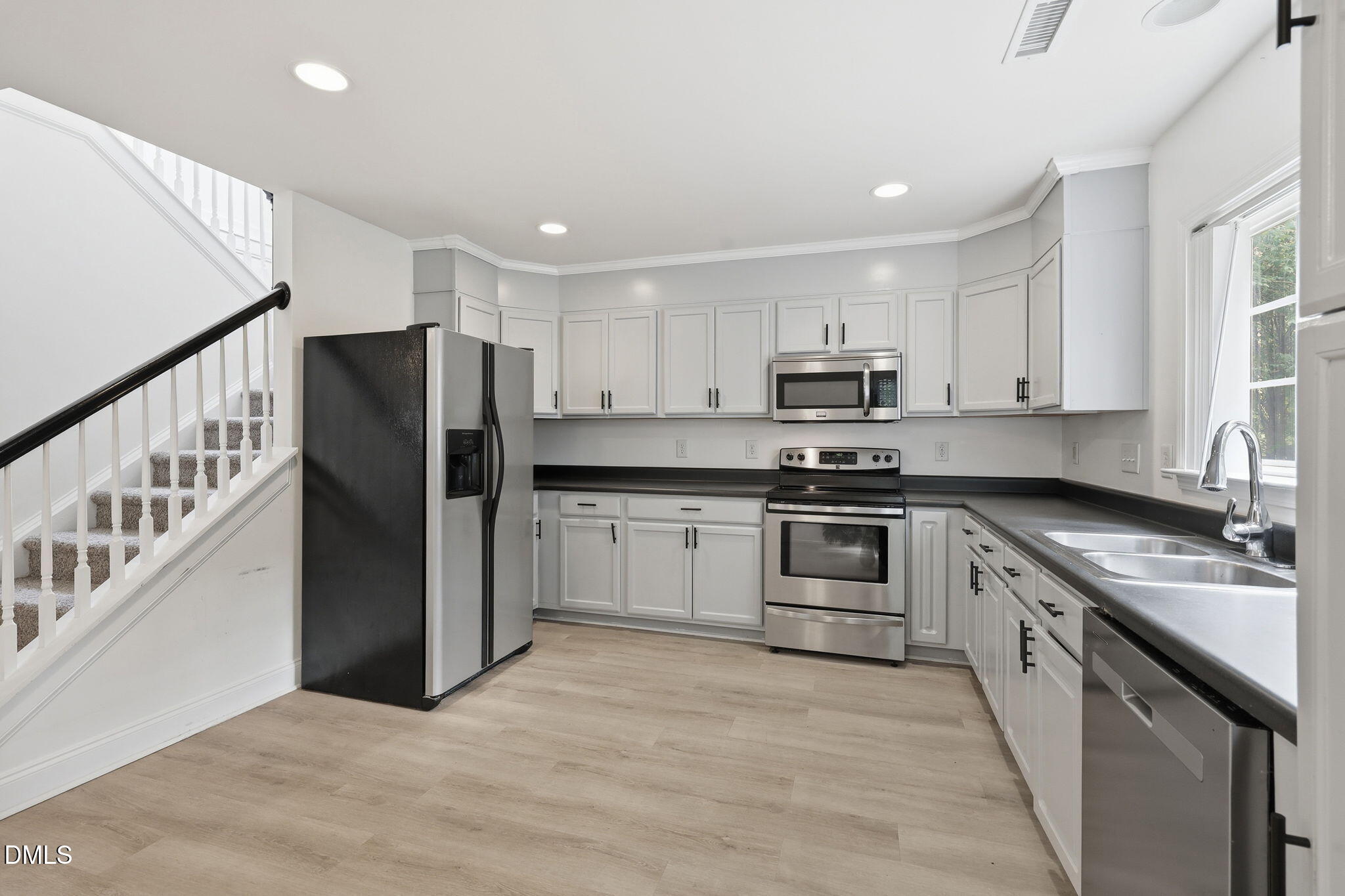 197 Depot Ridge Road Garner, NC 27529 - Photo 15 of 35 27 Kitchen and stairs