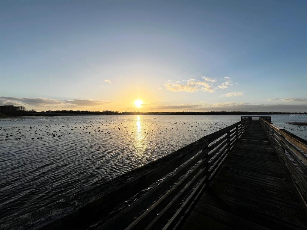 4352 South Kirkman Road, Unit 1203 Orlando, FL 32811 - Photo 23 of 27 Sunsets on the community dock