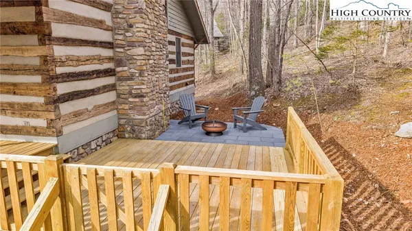 a kitchen with stainless steel appliances granite countertop a sink a stove and cabinets