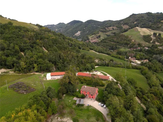 an aerial view of residential houses and outdoor space