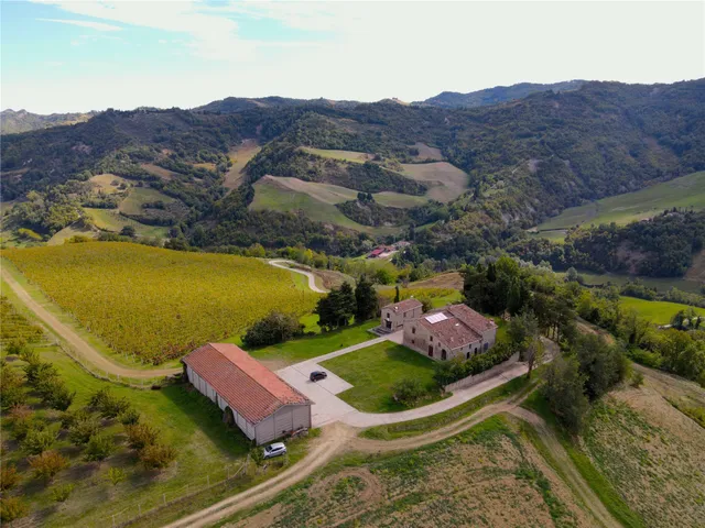 an aerial view of residential houses and outdoor space