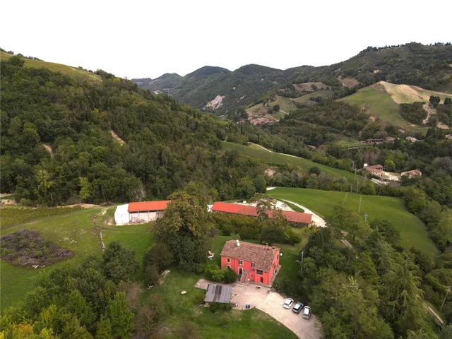 a aerial view of a house with a yard