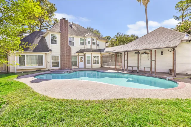 a view of outdoor space yard and front view of a house