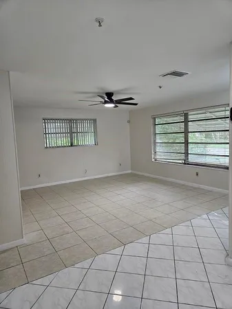 a view of an empty room and window