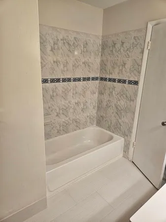 a bathroom with a bathtub
