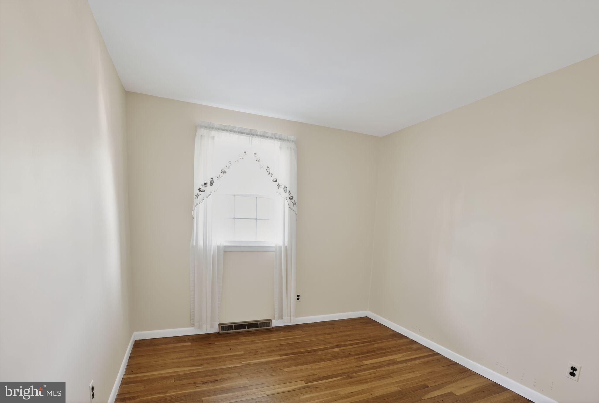 1901 Suffolk Road Finksburg, MD 21048 - Photo 11 of 35 an empty room with wooden floor