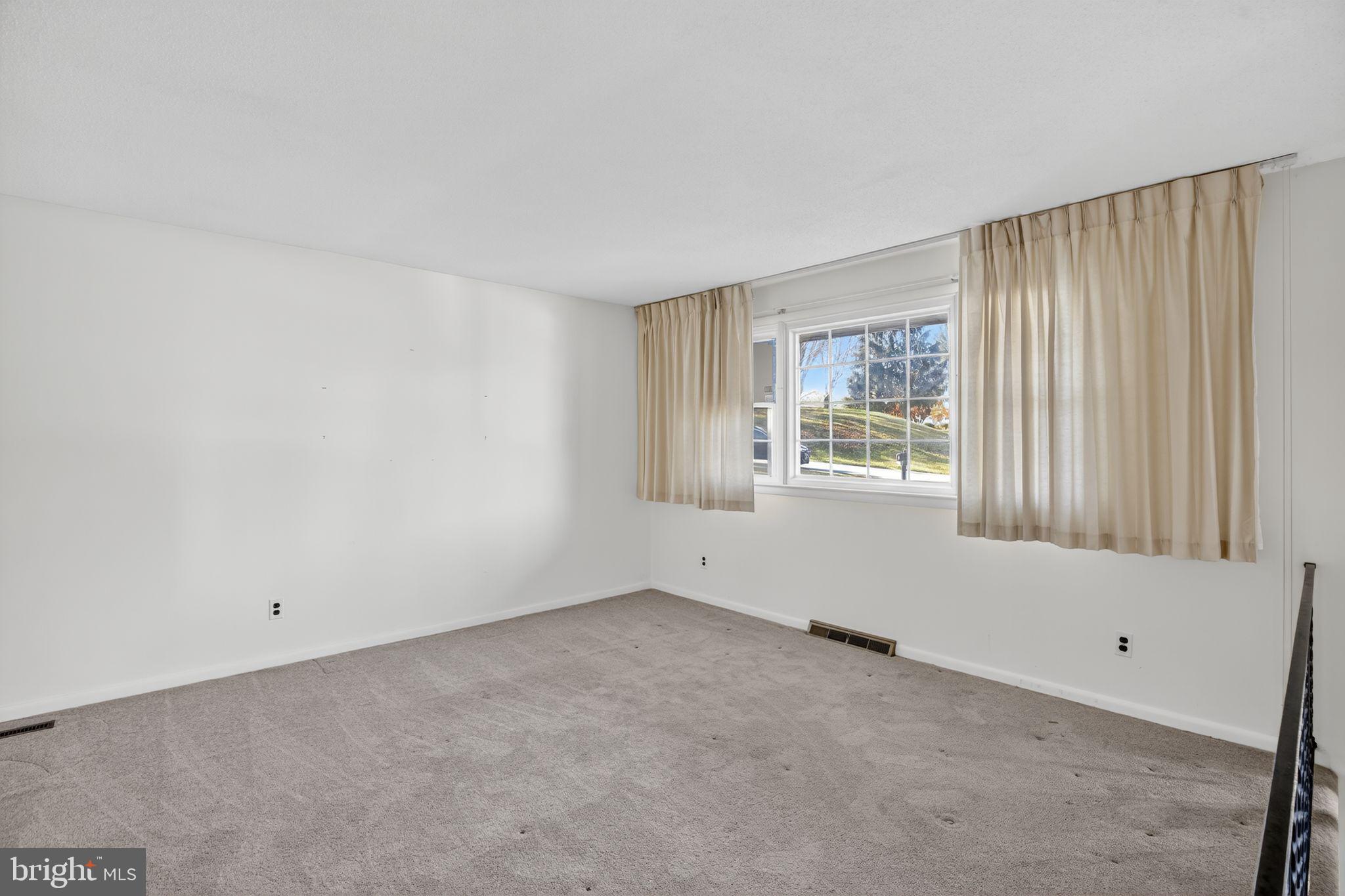 1901 Suffolk Road Finksburg, MD 21048 - Photo 14 of 35 a view of an empty room with a window