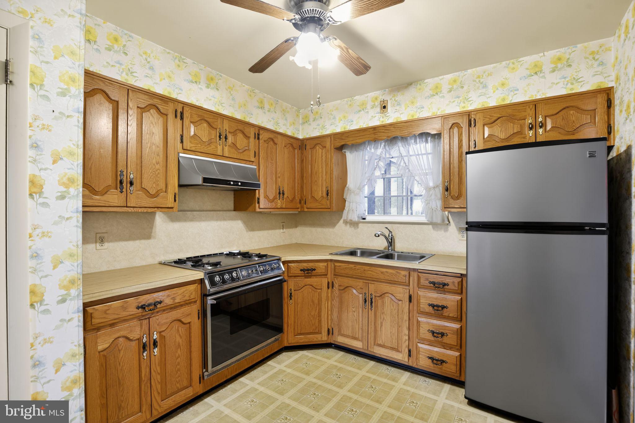 1901 Suffolk Road Finksburg, MD 21048 - Photo 17 of 35 a kitchen with a sink appliances and cabinets