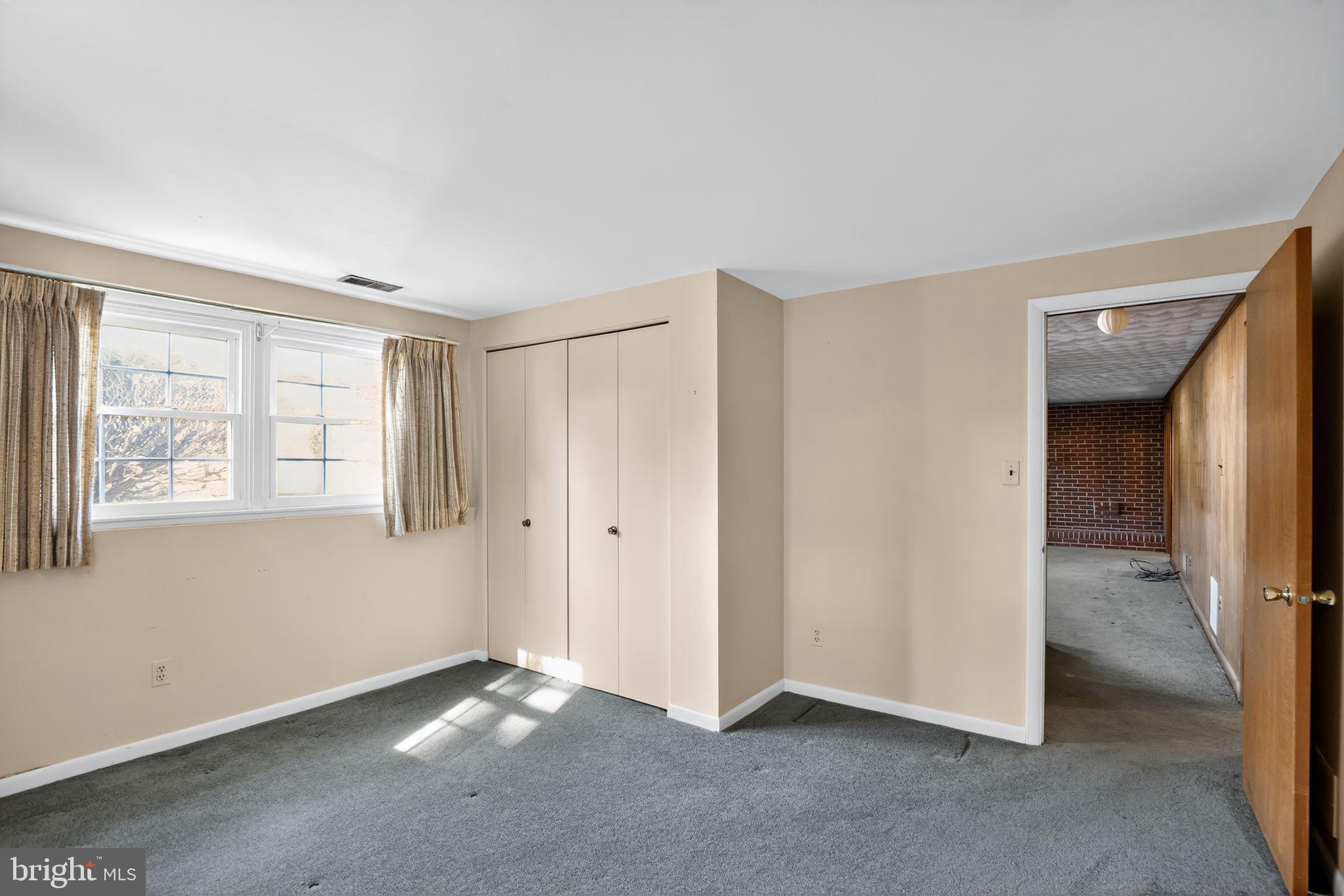 1901 Suffolk Road Finksburg, MD 21048 - Photo 21 of 35 a view of an empty room with a window