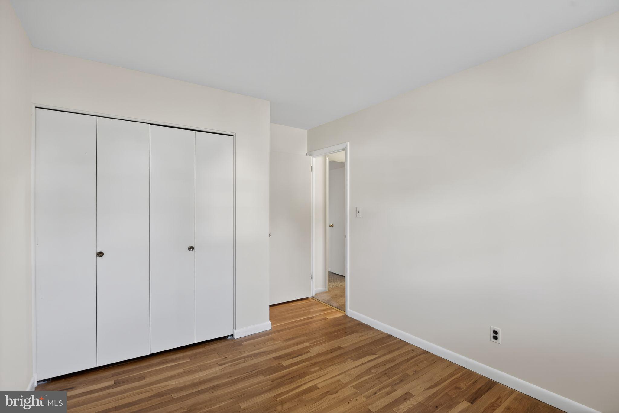 1901 Suffolk Road Finksburg, MD 21048 - Photo 23 of 35 a view of an empty room with wooden floor