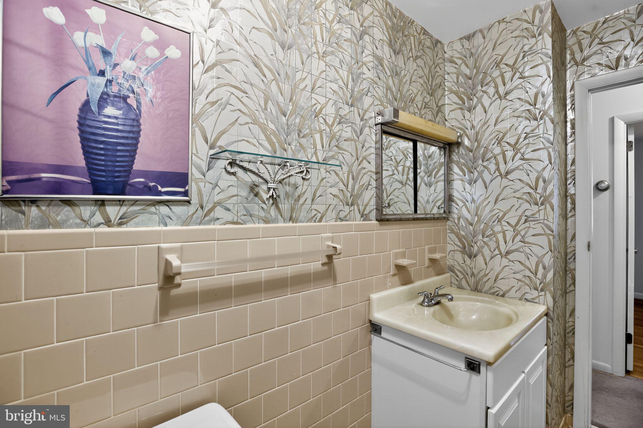 1901 Suffolk Road Finksburg, MD 21048 - Photo 28 of 35 a bathroom with a sink and a mirror