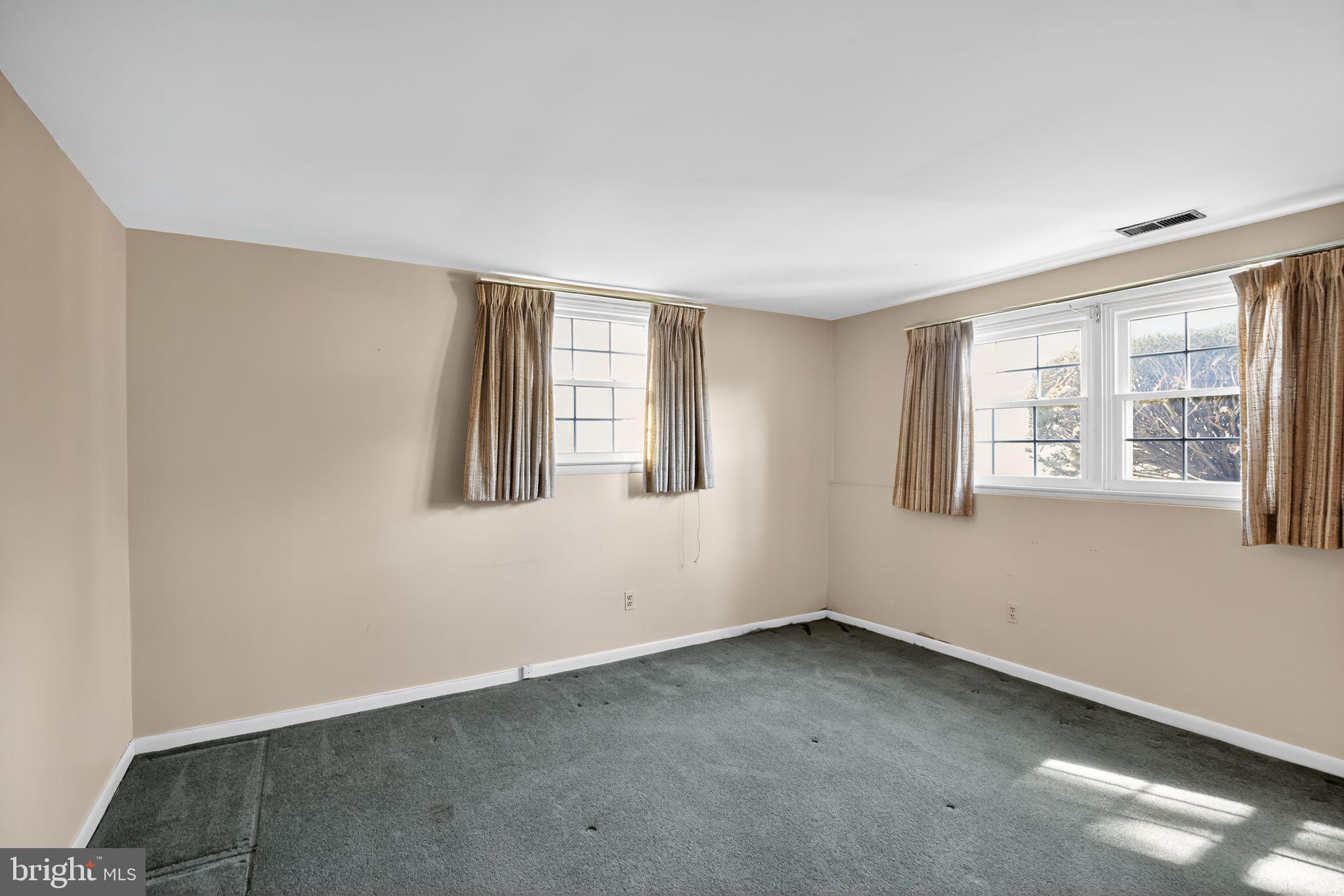1901 Suffolk Road Finksburg, MD 21048 - Photo 5 of 35 a view of an empty room with a window