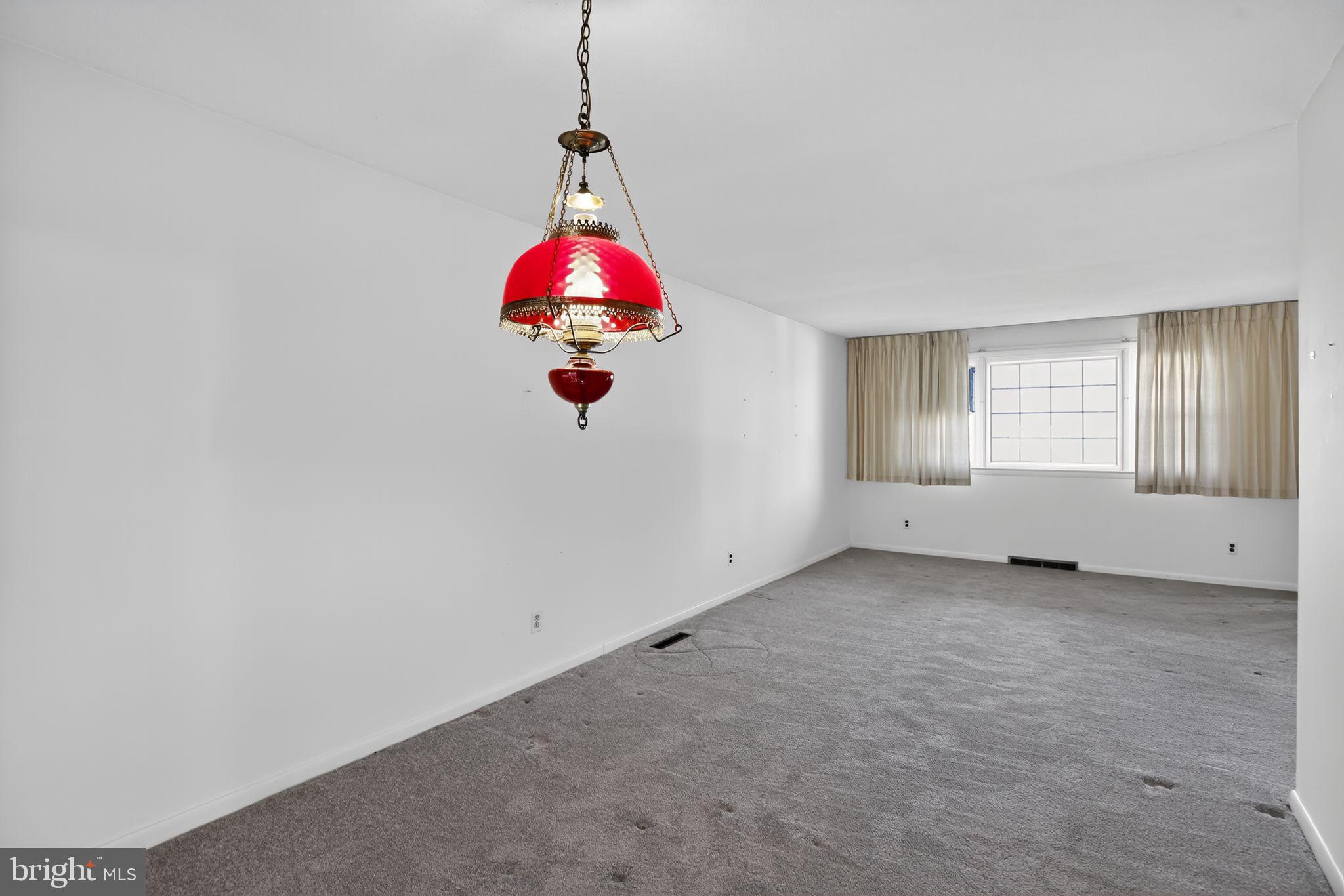 1901 Suffolk Road Finksburg, MD 21048 - Photo 6 of 35 a view of a room with window and chandelier