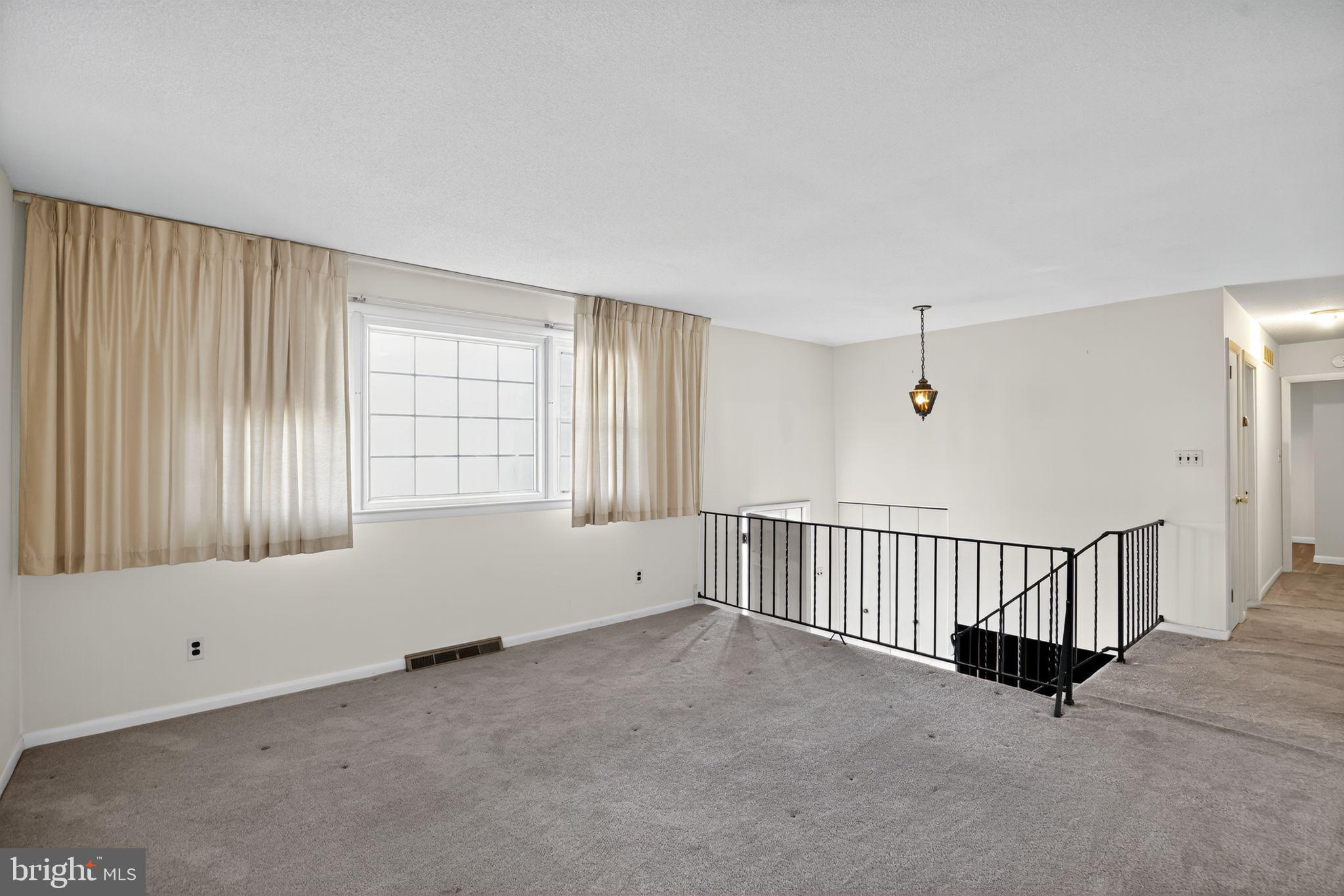 1901 Suffolk Road Finksburg, MD 21048 - Photo 10 of 35 an empty room with windows