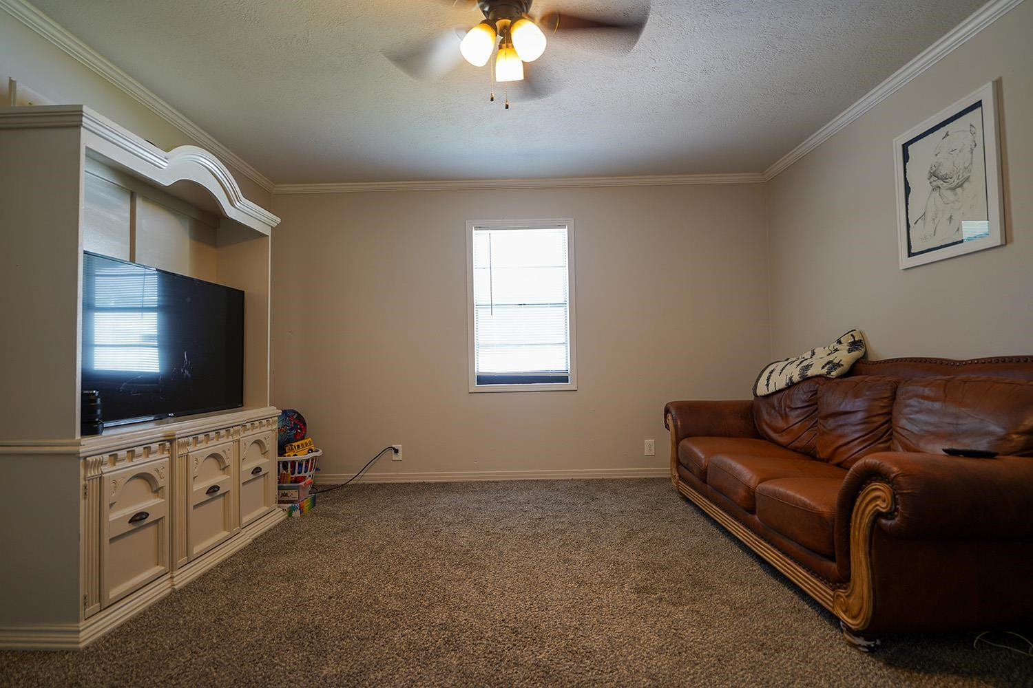 404 West Mill Street Rutherford, TN 38369 - Photo 3 of 12 a living room with furniture and a flat screen tv