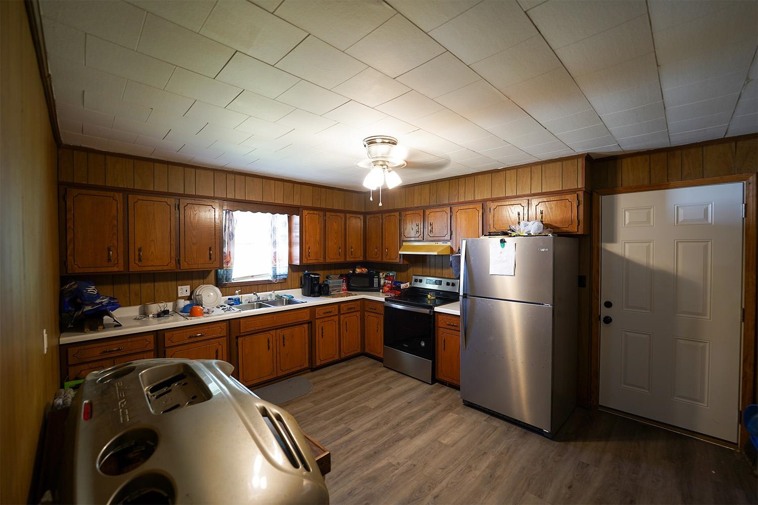 404 West Mill Street Rutherford, TN 38369 - Photo 5 of 12 a kitchen that has a refrigerator a sink and a stove